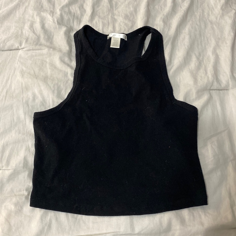 Black cotton racer back tank top. Size medium. Brand is bozzolo